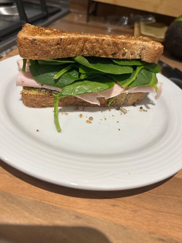 Avocado and Turkey Sandwich with Fruits and Seeds